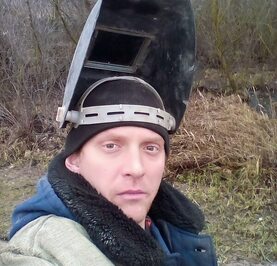 Николай