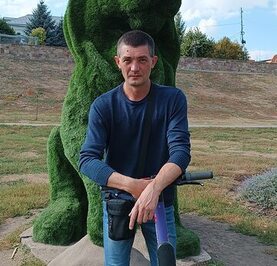 Николай